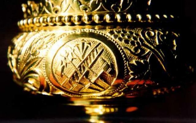 Gilt sterling chalice base engraved with the instruments of the Passion